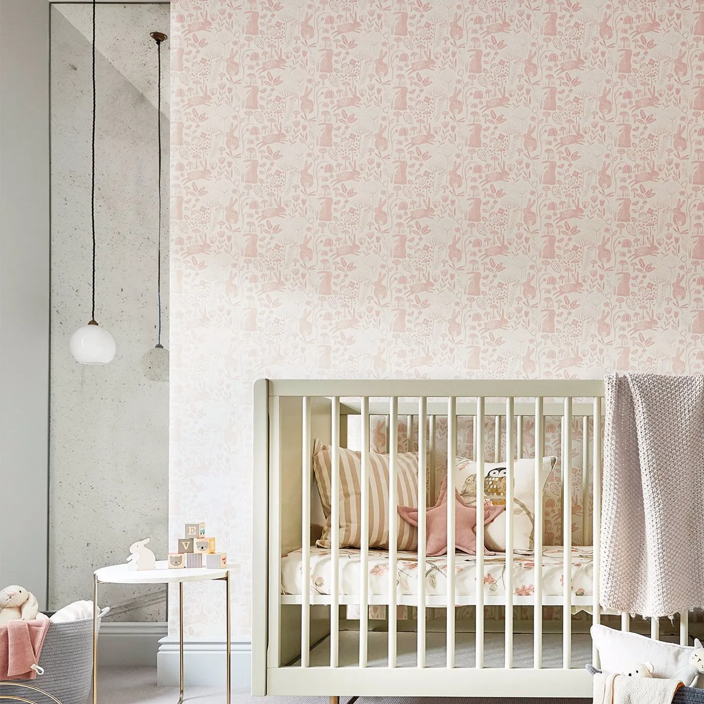 Minimalist space with dark surface against a reddish-pink wall