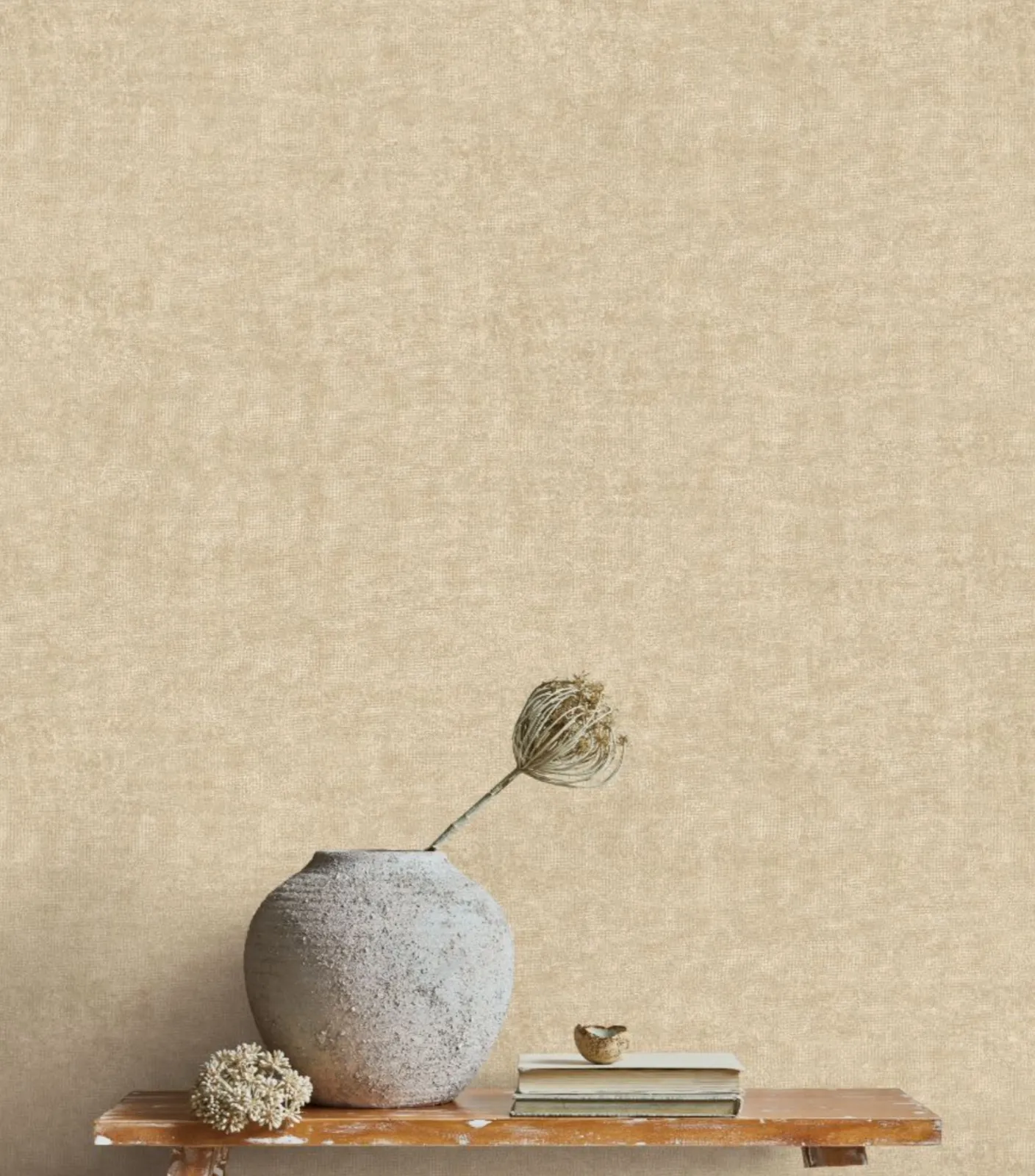 Minimalist space with dark surface against a reddish-pink wall