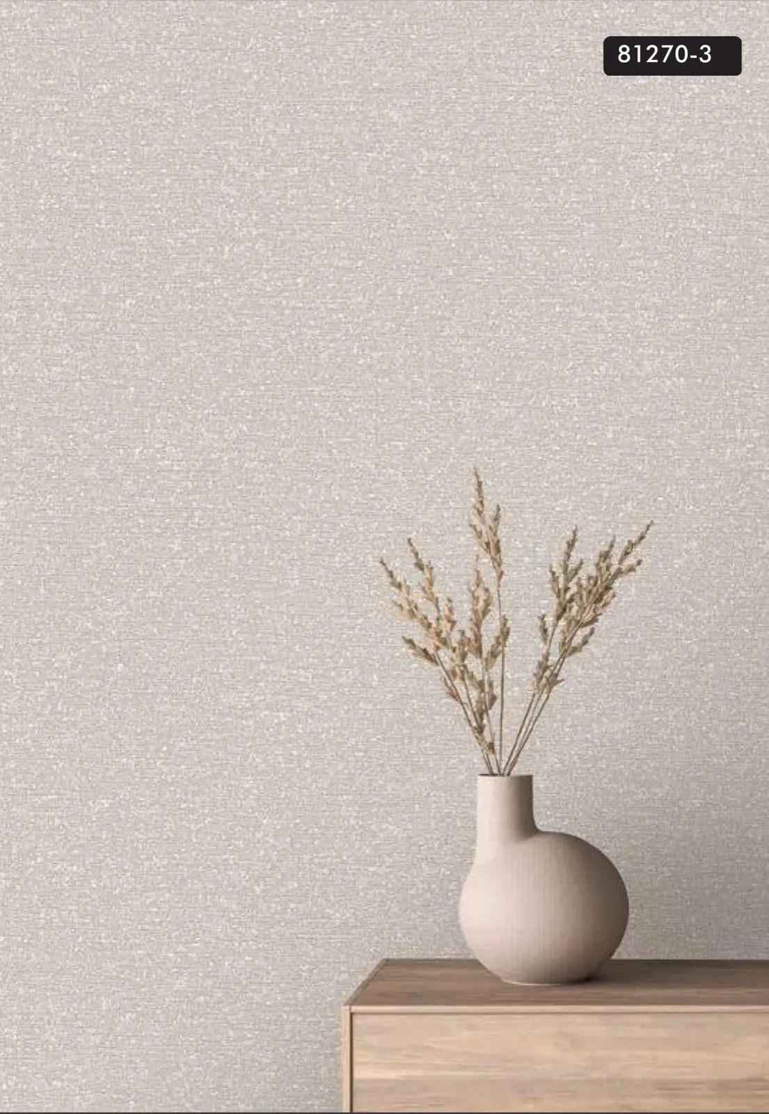 Minimalist space with dark surface against a reddish-pink wall